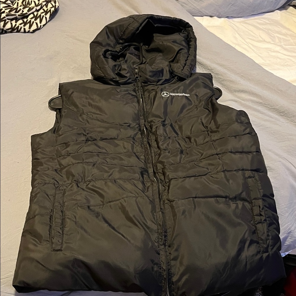 Women's Black Mercedes Benz puffer vest with pockets and removable Hood